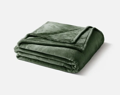 Our Fir Cashmere Touch Blanket folded neatly on a white background.
