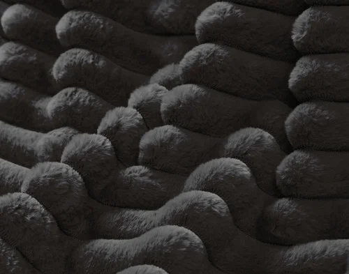 Close up on the surface of our Channel Plush Throw - Dark Slate.