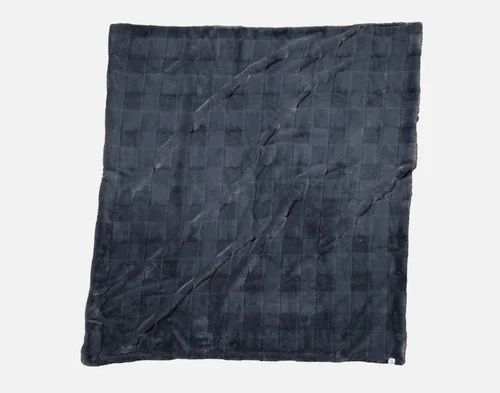 Our Etched Check Throw - Night Tide lying on a white background.