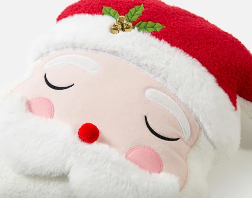 Angled view of our Sleeping Santa Holiday Cushion to show its soft surface.
