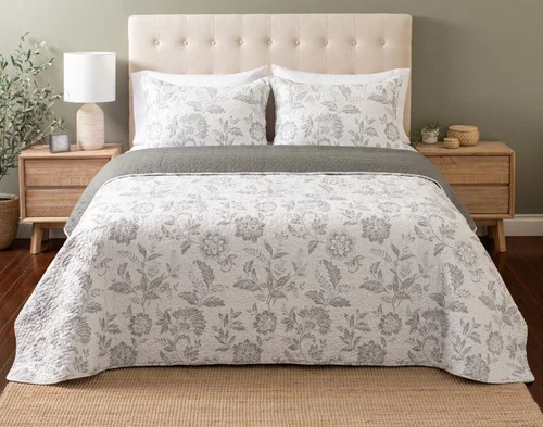 Front view of our Odette Coverlet Set dressed over an empty queen bed.