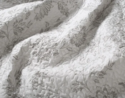 Close-up of the floral design on our Odette Coverlet Set.