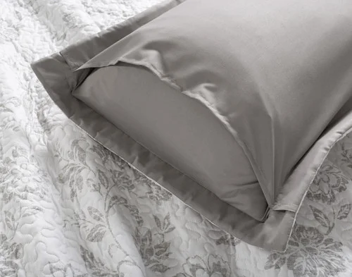 Reverse view of the envelope enclosure on a pillow sham from our Odette Coverlet Set.