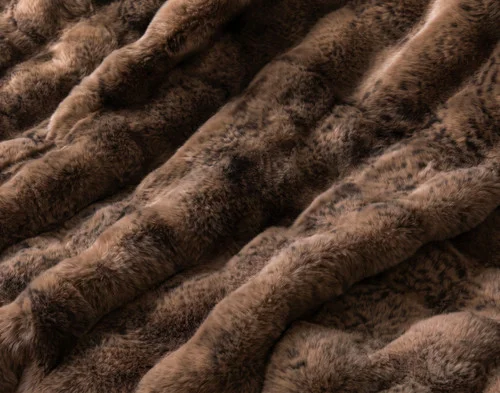 Close up on the surface of our Bubble Faux Fur Throw in Sable.
