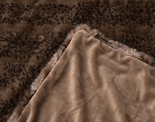 The folded corner of our Bubble Faux Fur Throw in Sable.