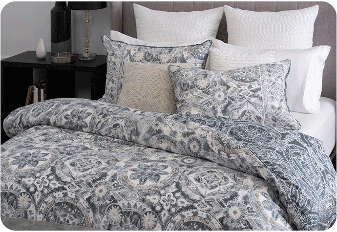 Slideshow gif of various duvet covers featuring smooth surfaces and printed patterns.