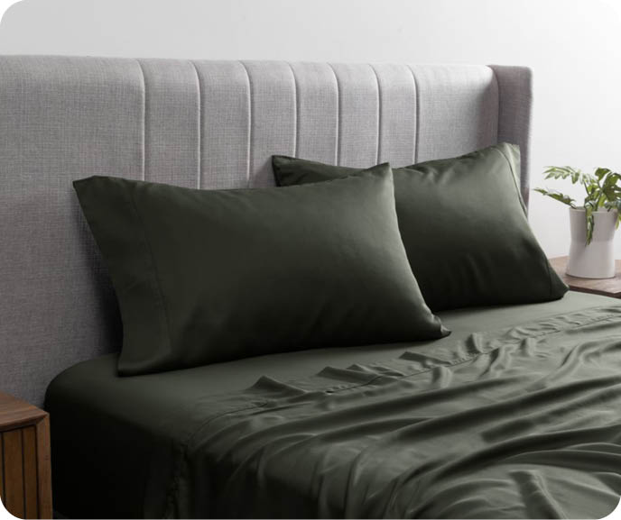 Our BeechBliss TENCEL Modal™ Sheet Set in Rainforest shown on a bed. Our bestselling sheeting is available in a variety of colours, with new arrivals every season.