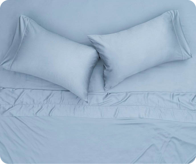 Our Sky Bamboo Cotton Sheet Set is a pale blue colour and comes with a flat sheet, fitted sheet and pillowcase(s).