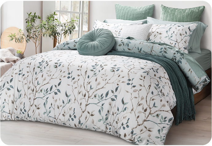Our Lakewood white duvet cover and coordinating pillow shams with a pale blue reverse. 