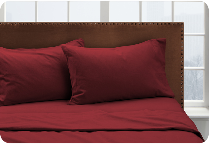 Our Flannel Cotton Sheet Set in Rhubarb is made from soft brushed cotton and comes in a deep red hue