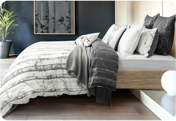 Our Birchwood Bedding Collection includes a white duvet cover with graphic print, and coordinating pillow shams.