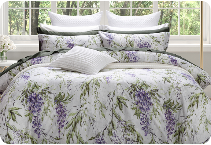 Our Prose Bedding Collection includes a purple floral design and coordinating pillow shams