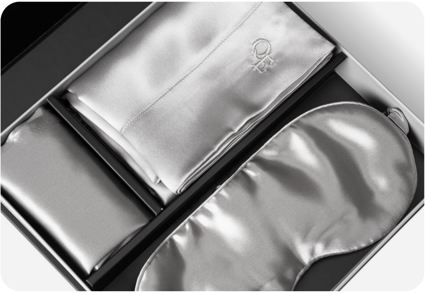 Our Mulberry Silk Gift Set In Silver with Eye Mask, Delicates Bag and Pillow Case displayed in its packaging