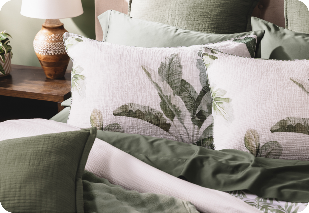 Our Sail Away Pillow Shams dressing the head of a bed.