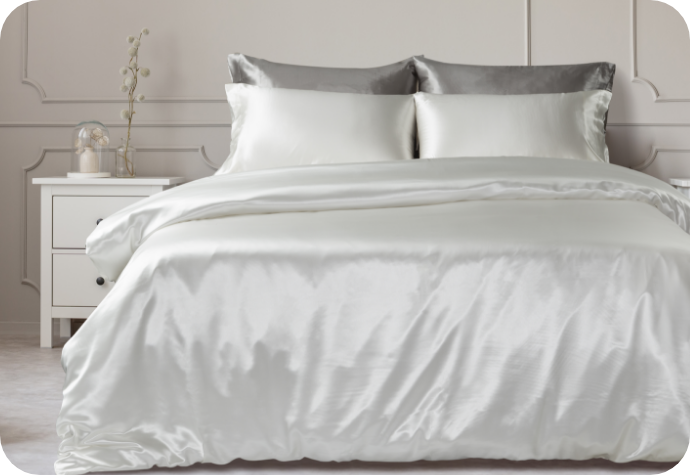 A silk duvet cover dressing a queen bed.