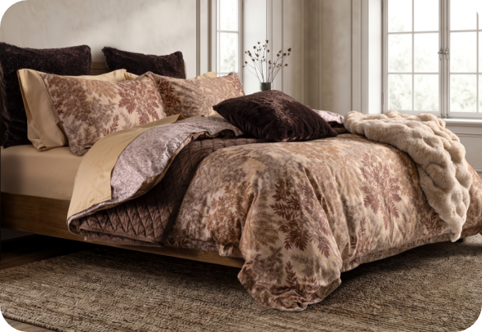 Our Henna Leaf Duvet Cover dressing a queen bed with accessories.