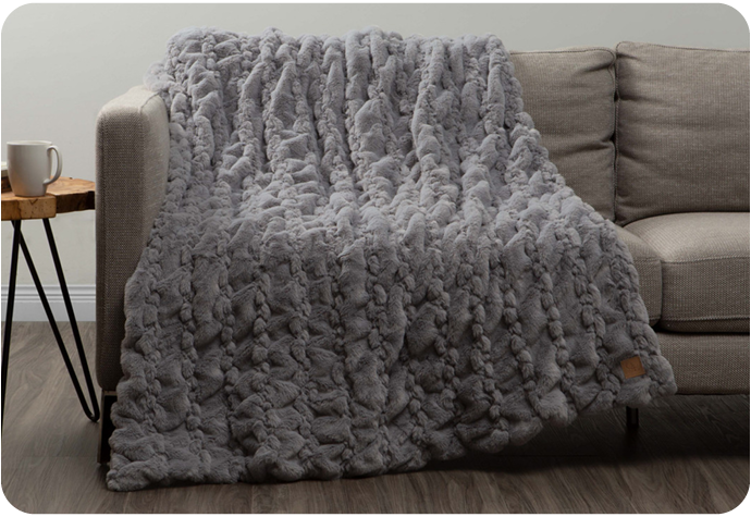 Our Rabbit Carved Faux Fur Throw in Silver features a 3D texture in soft faux fur.