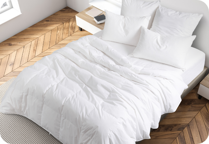 Our Chilko Down Duvet A queen bed dressed in our Chilko Down Duvet.