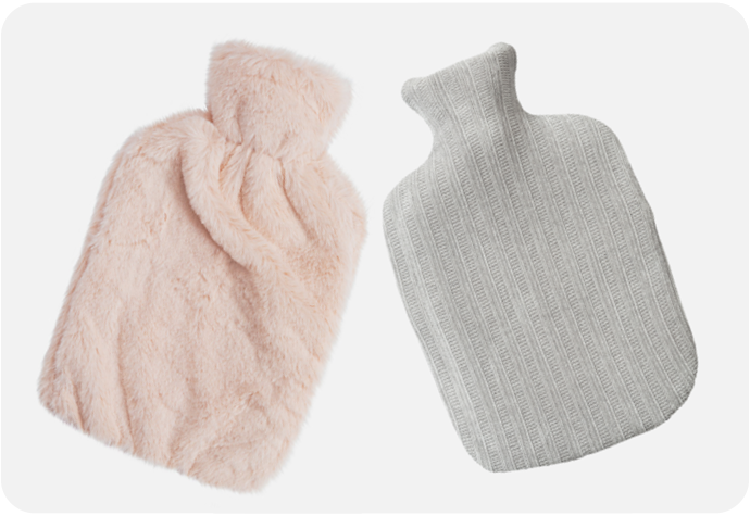 Our Plush Faux Fur Hot Water Bottle in Blush Pink and our Chenille Sherpa Hot Water Bottle in Grey on a white background.