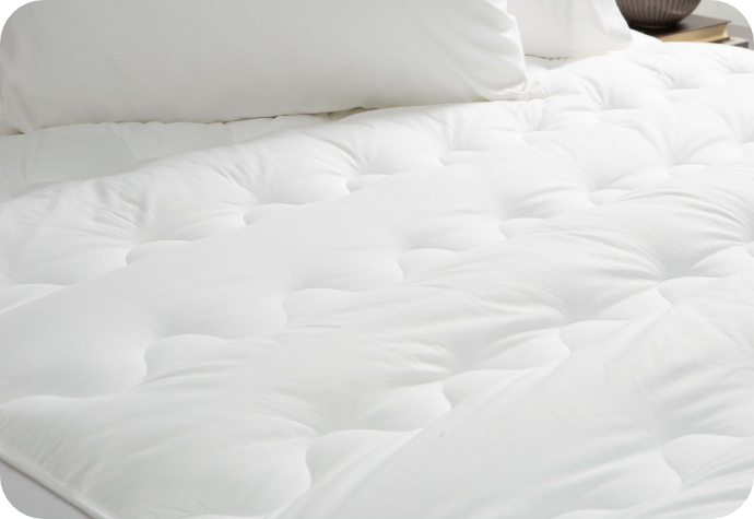 Easy, breezy, cushioned protection Our pillow top protector
