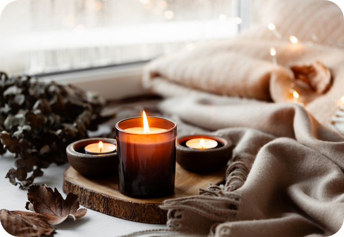 A cozy fall table with a candle.