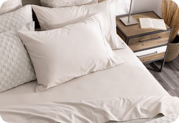 Our Cavendish Pillow Shams The head of a bed dressed in our Cavendish Duvet Cover Set.