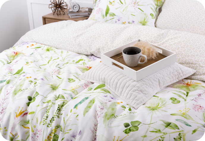 Angled view of a white bed dressed in our Faroe Duvet Cover with a coffee cup on a tray overtop. Angled view of a white bed dressed in our Faroe Duvet Cover with a coffee cup on a tray overtop.
