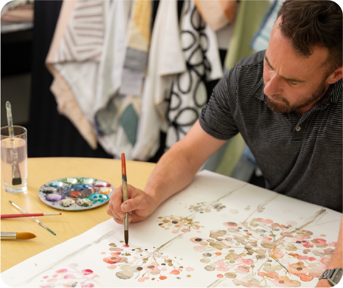 Our Creative Director Ross, painting the original watercolour for our Angelica collection