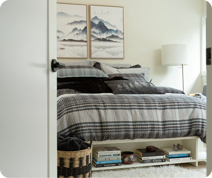 The Vilanova Duvet Cover from the Portugal Reserve Collection dressing a white bed with its matching pillow shams and a black throw blanket. The Vilanova Duvet Cover from the Portugal Reserve Collection dressing a white bed with its matching pillow shams and a black throw blanket.