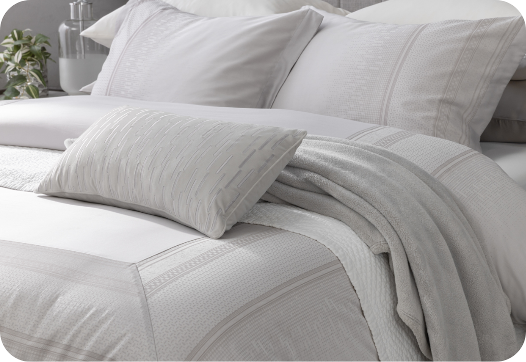 Our Renley Duvet Cover Our Renley Duvet Cover dressing a queen bed with accessories.