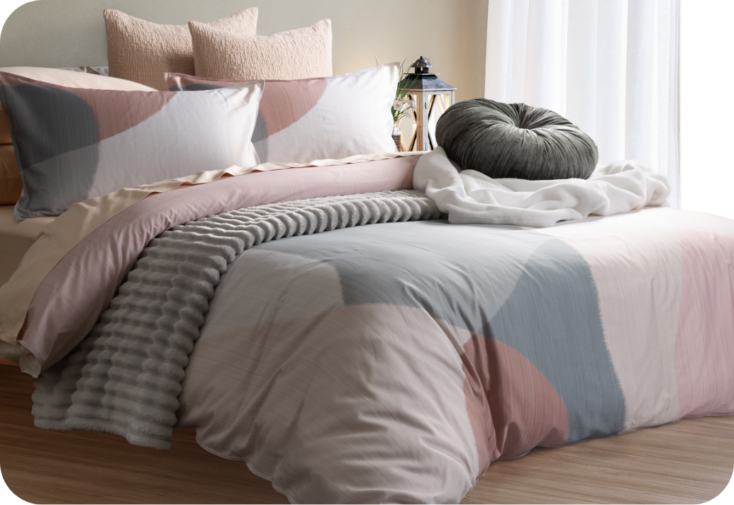 Our Tarna Duvet Cover Our Tarna Duvet Cover dressing a queen bed with accessories.