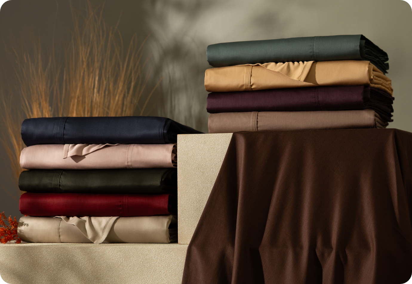 A stack of sheets on a table.